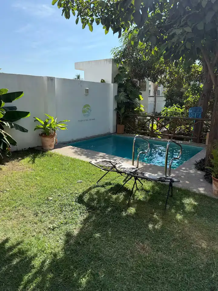 Fotografía 10 de departamento Casa Tropical 2 en Bucerías | Estancia con Alberca y Wifi